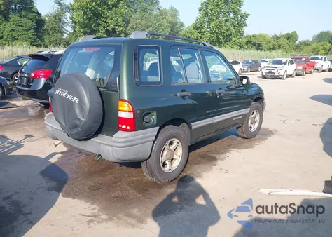 1999 Chevrolet Tracker from USA, damaged, VIN 2CNBJ13C9X6928226